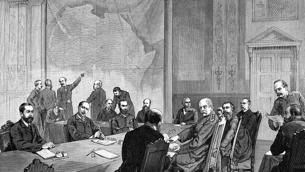 A drawing of the Berlin conference with a giant map of Africa